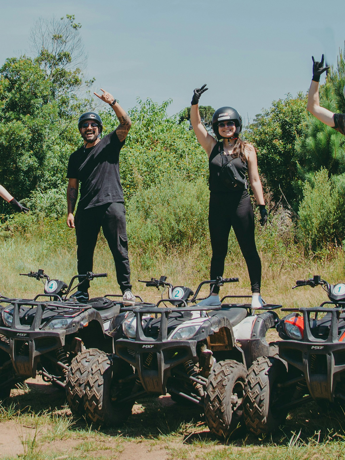 Group of riders on ATVs in Jacó